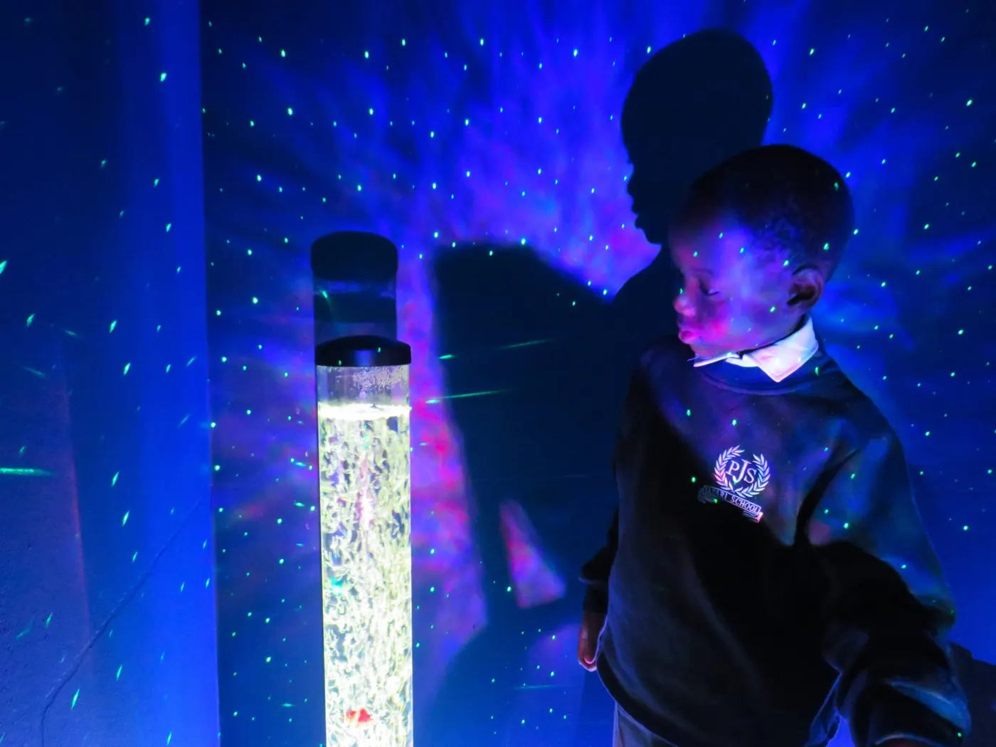 A pupil at the bubble tube
